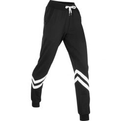 Spodnie dresowe z paskami. Czarne spodnie dresowe damskie bonprix, bez wzorów, z dresówki, na fitness i siłownię. Za 94.99 zł.
