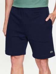 Lacoste Szorty sportowe GH9627 Granatowy Regular Fit. Niebieskie krótkie spodenki sportowe męskie Lacoste, m, bez wzorów, z bawełny. Za 329.99 zł.