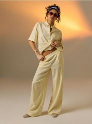 Spodnie wide leg z domieszką lnu - żółty. Żółte spodnie materiałowe damskie Sinsay, l, bez wzorów. Za 59.99 zł.