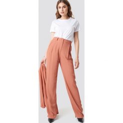 MANGO Spodnie Pinky - Orange. Spodnie materiałowe damskie marki Mango. Za 202.95 zł.