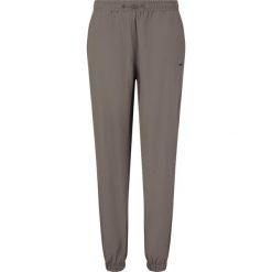 Damskie spodnie dresowe Athlecia Hero. Brązowe obuwie sportowe damskie Athlecia, bez wzorów, z dresówki. Za 177.00 zł.