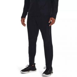 Spodnie dresowe męskie Under Armour STORM RUN PANT. Czarne spodnie sportowe męskie Under Armour, m, bez wzorów, z dresówki, do biegania. Za 229.99 zł.