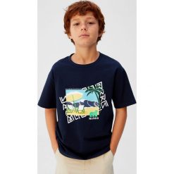 Mango Kids - T-shirt dziecięcy Volendam 110-164 cm. Niebieskie t-shirty dla chłopców Mango Kids, bez wzorów, z bawełny, bez ramiączek. W wyprzedaży za 29.90 zł.