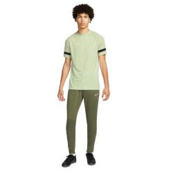 Męskie Spodnie Do Biegania Academy DriFIT. Zielone spodnie sportowe męskie Nike, m, bez wzorów, z materiału, do biegania, dri-fit (nike). Za 139.99 zł.