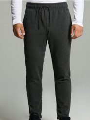 Spodnie dresowe ze strukturalnej dzianiny - czarny. Czarne spodnie sportowe męskie Sinsay, l, bez wzorów, z dresówki. Za 49.99 zł.