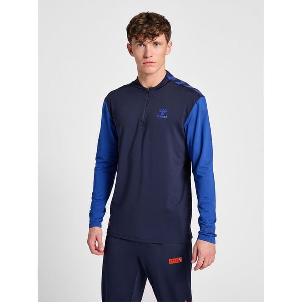 Bluza dresowa 1/2 zip Hummel Pro Grid. Niebieskie bluzy męskie Hummel, bez wzorów, z dresówki, bez kaptura, do piłki ręcznej. W wyprzedaży za 254.55 zł.