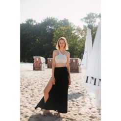 Spódnica do jogi Moonholi Flowcut z rozporkami. Czarne spódnice damskie MOONHOLI, bez wzorów. Za 369.00 zł.