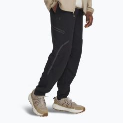 Spodnie męskie Under Armour Unstoppable Cargo. Czarne buty sportowe męskie Under Armour, bez zapięcia, na fitness i siłownię. Za 409.99 zł.
