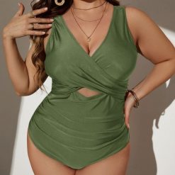 Jednoczęściowy strój kąpielowy z marszczeniem na plażę i basen Sumanda. Czarne kostiumy jednoczęściowe damskie Intica, xl, bez wzorów, z materiału, do pływania. Za 169.00 zł.