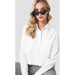 NA-KD Trend Koszula jeansowa z surowym brzegiem - White. Koszule damskie marki NA-KD Trend. W wyprzedaży za 80.97 zł.