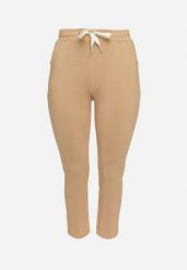 Beżowe Dresowe Spodnie Joggery z Wysokim Stanem i Napisami Lerithelle. Brązowe spodnie dresowe damskie Born2be, l, bez wzorów, z dresówki. Za 44.99 zł.