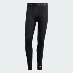 Legginsy TECHFIT Compression Training Long. Czarne legginsy sportowe męskie Adidas, l, bez wzorów, z materiału, do piłki nożnej, techfit (adidas). Za 179.00 zł.