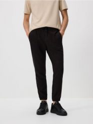 Spodnie jogger z lnem - czarny. Czarne spodnie materiałowe męskie Reserved, l, bez wzorów, z wiskozy. W wyprzedaży za 119.99 zł.