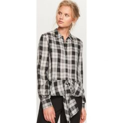 Koszula w kratę - Czarny. Koszule damskie marki SOLOGNAC. W wyprzedaży za 39.99 zł.