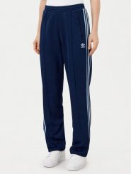 Adidas Spodnie dresowe Beckenbauer JC5793 Granatowy Regular Fit. Niebieskie spodnie dresowe damskie Adidas, xl, bez wzorów, z bawełny. Za 179.99 zł.