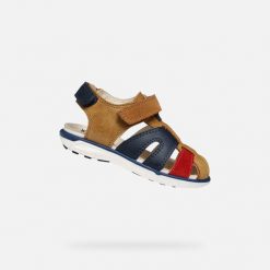 Sandały GEOX B SANDAL DELHI BOY Brązowy. Brązowe sandały męskie Geox, ze skóry, bez zapięcia. Za 213.99 zł.