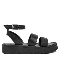 Sandały Calvin Klein. Czarne sandały dziewczęce Calvin Klein, bez zapięcia. Za 509.99 zł.