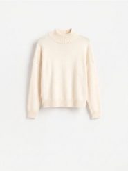 Sweter z obniżoną linią ramion - kremowy. Białe swetry damskie Reserved, l, bez wzorów, z dzianiny, bez kołnierzyka, bez ramiączek, bez kaptura. Za 119.99 zł.