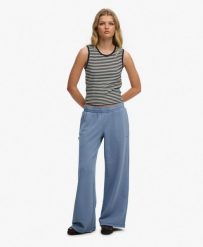 Superdry Damskie Spodnie Joggers Wide Leg Essential Logo – Tidal Blue. Niebieskie spodnie materiałowe damskie Superdry., bez wzorów, z bawełny. Za 250.25 zł.