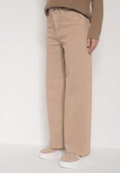 Beżowe Szerokie Jeansy z Wysokim Stanem i Postrzępionymi Nogawkami Fyrelreia. Brązowe jeansy damskie Born2be, z podwyższonym stanem. Za 99.99 zł.