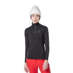 Koszulka termoaktywna Rossignol W Classique 1/2 Zip. Czarne koszulki sportowe damskie Rossignol, xl, bez wzorów, z materiału, bez kołnierzyka, bez ramiączek, narciarskie. Za 339.99 zł.