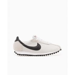 Buty Sportowe Damskie Nike W Ld‑1000. Białe obuwie sportowe damskie Nike, bez wzorów, do biegania. Za 303.60 zł.