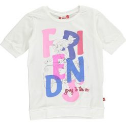Koszulka "Tanya 309" w kolorze białym. T-shirty i topy dla dziewczynek marki LEGO Wear. W wyprzedaży za 32.95 zł.