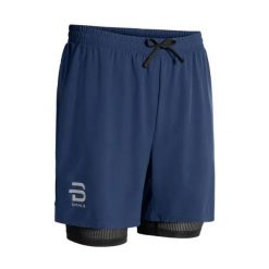 Szorty 2 w 1 Daehlie Sportswear. Niebieskie krótkie spodenki sportowe męskie DAEHLIE, m, bez wzorów, z elastanu, do biegania. Za 295.00 zł.