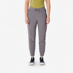 Spodnie turystyczne damskie Quechua MH500 Light. Fioletowe spodnie sportowe damskie QUECHUA, l, bez wzorów, z elastanu, trekkingowe. W wyprzedaży za 99.99 zł.