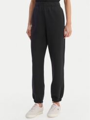 Lacoste Spodnie dresowe XF5244 Granatowy Regular Fit. Niebieskie spodnie dresowe damskie Lacoste, bez wzorów, z bawełny. Za 609.99 zł.