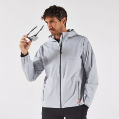 Kurtka do biegania przeciwdeszczowa męska Kiprun Run 900. Szare kurtki męskie KIPRUN, l, bez wzorów, z materiału, sportowe, bez kaptura. Za 399.99 zł.