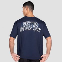 Koszulka męska fitness oversize granatowa Better Every Day. Koszulki sportowe męskie GYMBEAM, m, z aplikacjami, z bawełny, bez kołnierzyka, bez ramiączek, na fitness i siłownię. Za 88.90 zł.