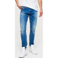 Jeansy COMFORT - Niebieski. Niebieskie jeansy męskie Cropp. Za 139.99 zł.