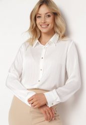 Biała Koszula o Klasycznym Fasonie Zapinana na Guziki Dlinesta. Białe bluzki damskie Born2be, l, bez wzorów, z jeansu, eleganckie, bez kołnierzyka, bez ramiączek. Za 59.99 zł.