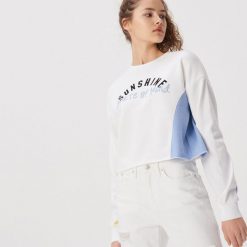 Krótka bluza w bloki kolorów - Kremowy. Bluzy damskie Sinsay. Za 39.99 zł.