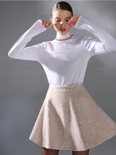 Spódnica mini z połyskującym cekinami - kremowy. Białe spódnice damskie Sinsay, l, bez wzorów, mini. Za 59.99 zł.