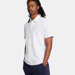Koszulka polo męska Under Armour UA Icon. Białe buty sportowe męskie Under Armour, l, bez wzorów, bez kołnierzyka, bez ramiączek, na golfa. Za 149.99 zł.