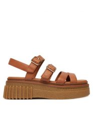 Clarks Sandały Evamar Strap 26185889 Brązowy. Brązowe sandały damskie Clarks, bez wzorów, ze skóry, bez obcasa, na płaskiej podeszwie, bez zapięcia. Za 519.99 zł.