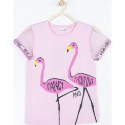 Coccodrillo - T-shirt dziecięcy 128-158 cm. Czerwone t-shirty i topy dla dziewczynek COCCODRILLO, bez wzorów, z bawełny, bez ramiączek. W wyprzedaży za 29.90 zł.