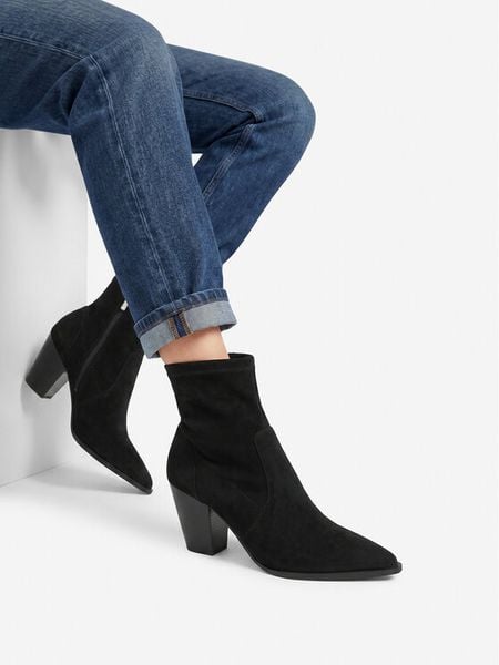 Nine West Botki EO-LBT805720-2 Czarny. Czarne botki damskie Nine West, z materiału, bez obcasa, na słupku, bez zapięcia. Za 329.99 zł.