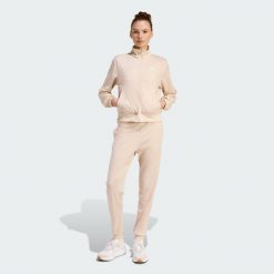 Dres Essentials Feel Cozy. Białe obuwie sportowe damskie Adidas, bez wzorów, z dresówki, na fitness i siłownię. Za 299.00 zł.