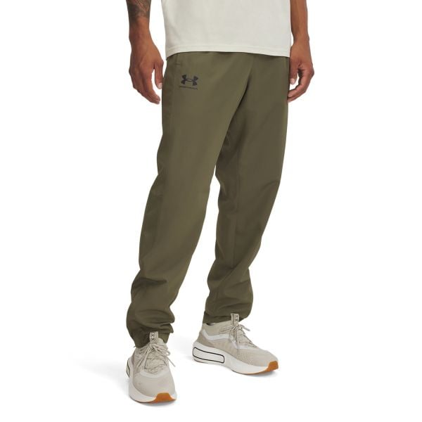 Under Armour UA RIVAL WVN WINDBREAKER PNT Spodnie męskie. Zielone spodnie sportowe męskie Under Armour, m, bez wzorów, z materiału, do biegania. W wyprzedaży za 155.99 zł.