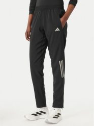 Adidas Spodnie dresowe Astro KC4947 Czarny Regular Fit. Czarne spodnie dresowe damskie Adidas, xs, bez wzorów, z dresówki, do biegania. Za 299.99 zł.