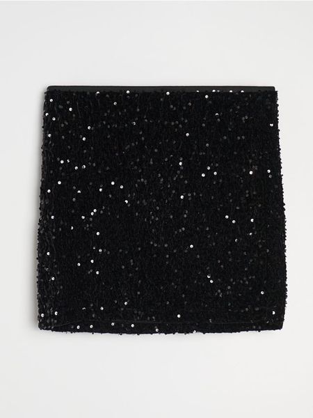 Spódnica mini z połyskiem - czarny. Czarne spódnice damskie Sinsay, l, bez wzorów, mini. Za 39.99 zł.