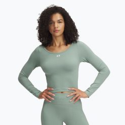 Longsleeve Under Armour Train Seamless. Zielone koszulki sportowe damskie Under Armour, bez wzorów, bez kołnierzyka, bez ramiączek, na fitness i siłownię. Za 189.99 zł.