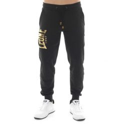 Herren Wintersporthose mit Bündchen, Leone 1947 Golddruck. Czarne spodnie sportowe męskie LEONE 1947 APPAREL, bez wzorów, z bawełny, na fitness i siłownię. W wyprzedaży za 132.62 zł.
