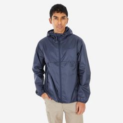 Kurtka turystyczna męska Quechua Raincut zamek. Niebieskie kurtki męskie QUECHUA, m, bez wzorów, z materiału, bez kaptura. Za 49.99 zł.