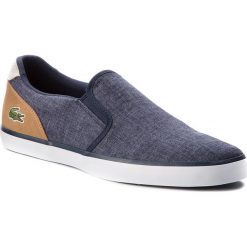Tenisówki LACOSTE - Jouer Slip On 218 1 Cam 7-35CAM0050NT9 Nvy/Lt Tan. Niebieskie trampki męskie Lacoste, z gumy. W wyprzedaży za 259.00 zł.