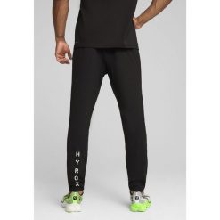Męskie spodnie dresowe CLOUDSPUN PUMA × HYROX PUMA Black. Czarne spodnie sportowe męskie Puma, l, bez wzorów, z dresówki, do biegania. W wyprzedaży za 184.00 zł.