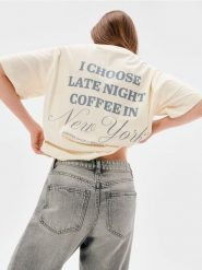 Bawełniana koszulka z napisem - żółty. Żółte t-shirty damskie Sinsay, l, bez wzorów, z bawełny, bez kołnierzyka. Za 25.99 zł.